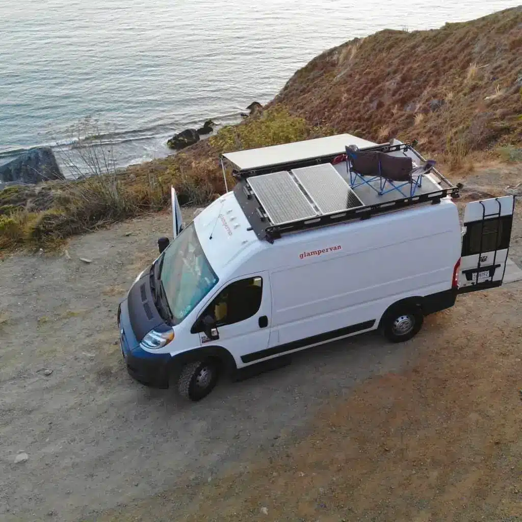 A top view of a white glampervan by seaside