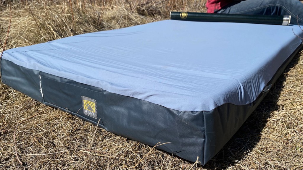 A view of a Hest Foamy Sleeping Pad for Camping laying in grass