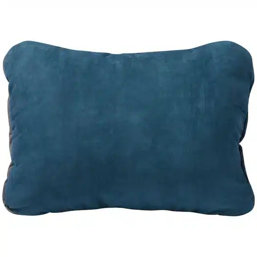 A view of a dark blue Therm a Rest Compressible Camping Pillow