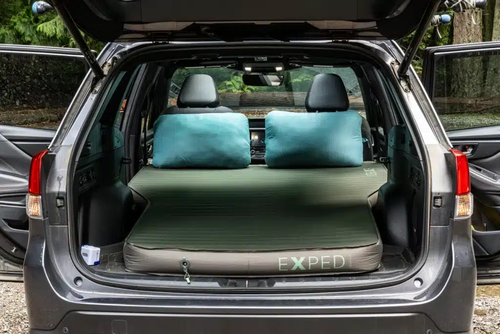 A view of an Exped Mega Mat Auto inside a car back