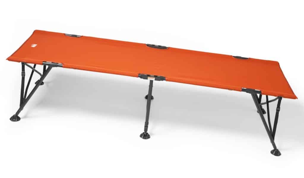 A view of an orange REI Co op Campwell Camping Cot