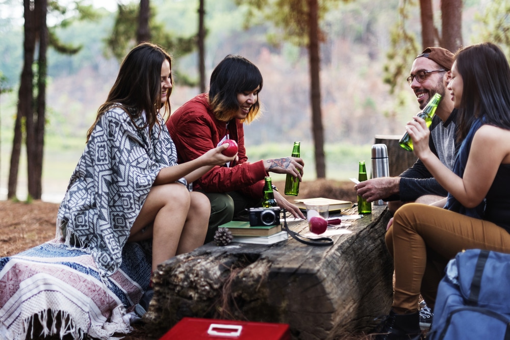 Campers Relaxing At The Campsite