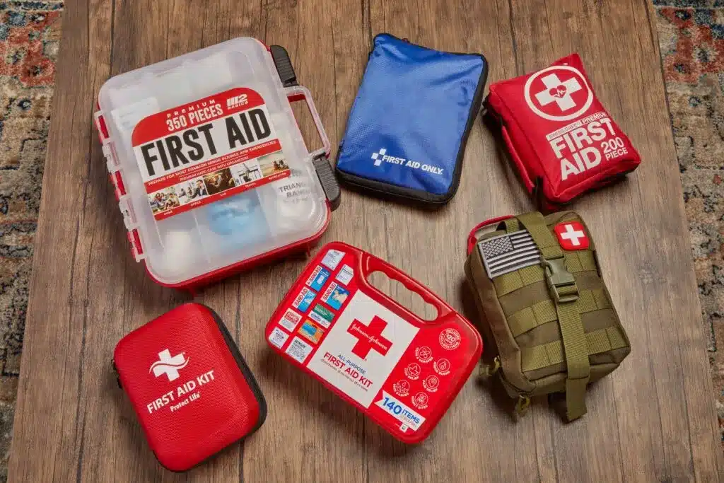 first aid kits placed ona wooden surface