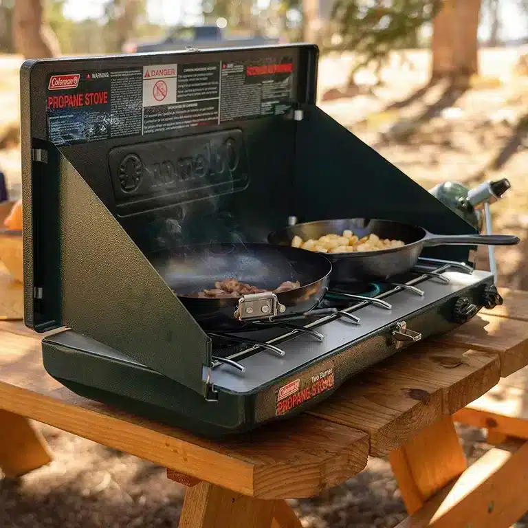 zoomed in view of best camping stove coleman food being cooked on it