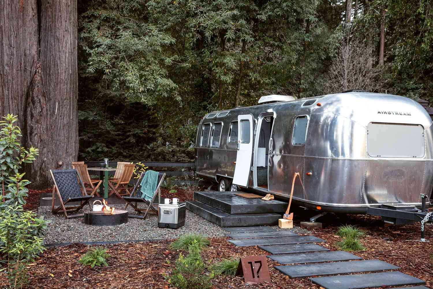 airstream trailer in woods