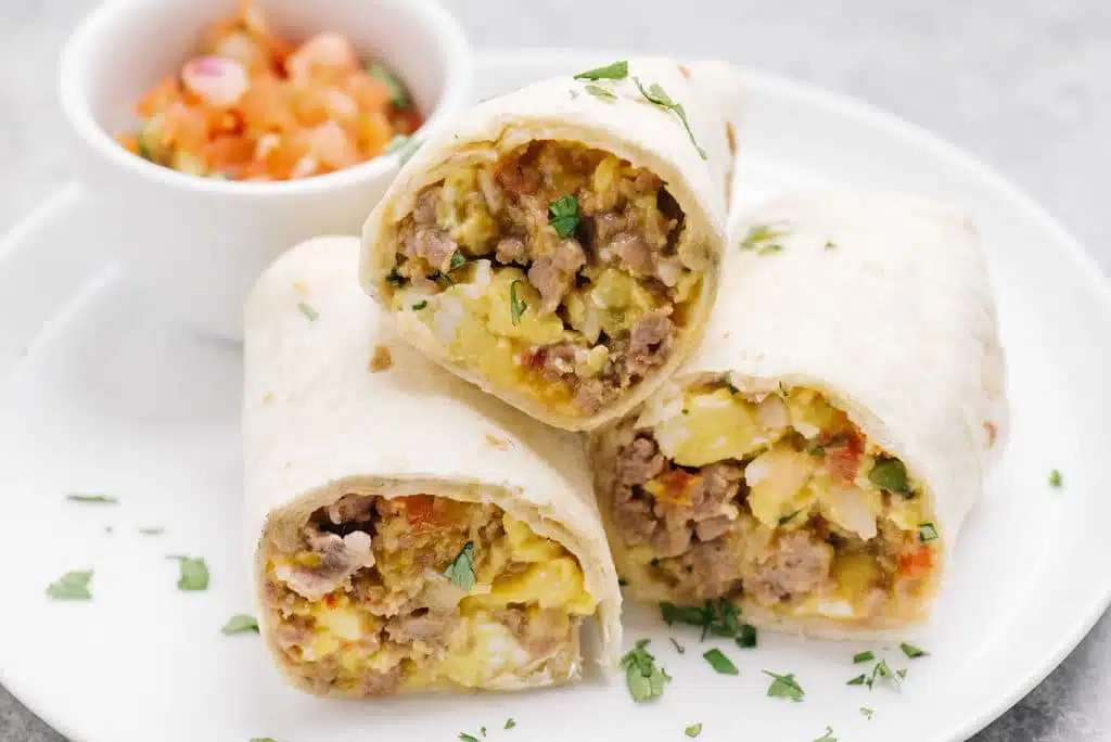 zoomed view of burritos in a plate