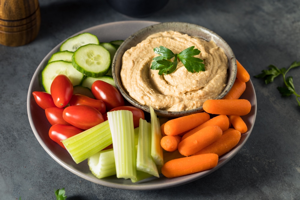 Healthy Homemade Veggie Hummus Plate With Carrot Tomato And Celery