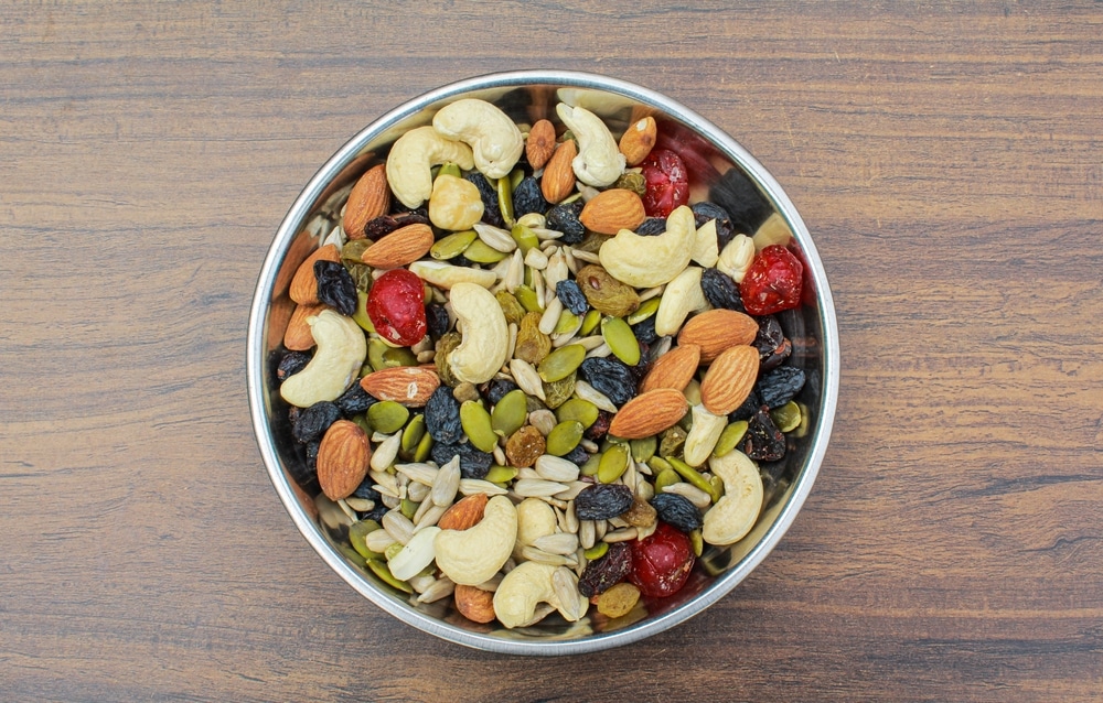 Trail Mix Nuts And Seeds In A Plate On Wooden